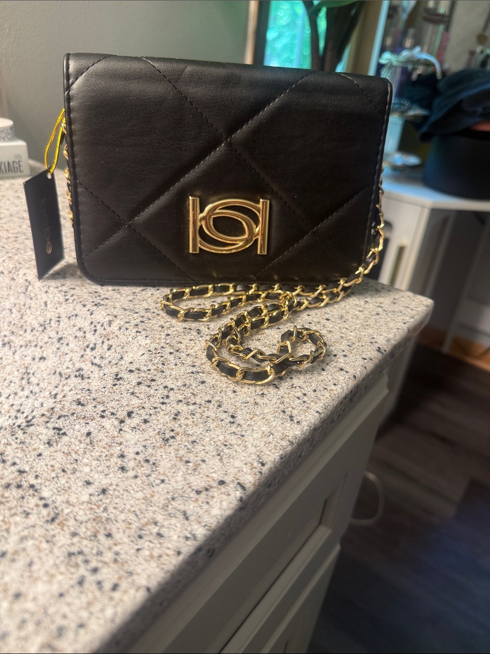 bebe Quilted Black Crossbody with Gold Chain and Logo